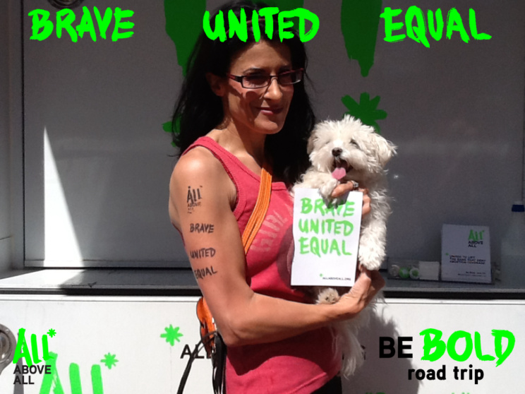 Lynn Julian, and her dog, Lil Stinker, are "United, Brave, Equal" supporting women's right to choose.