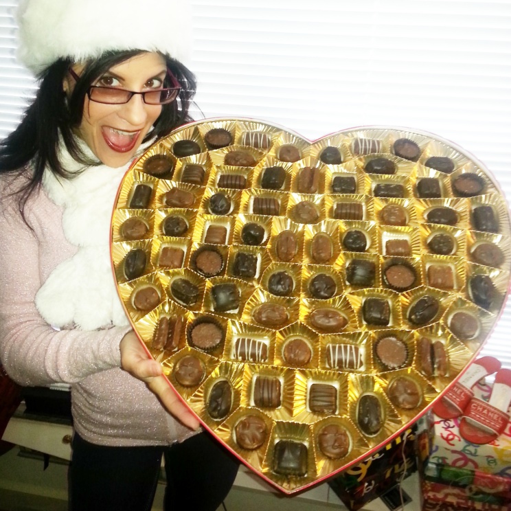 Lynn Julian, Boston Actress, with a HUGE, heart shaped box of chocolates for Valentine's Day.